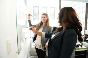 Two professionals discussing a project