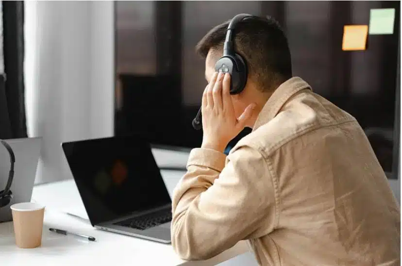 An advisor actively listening to a client on the phone