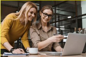 Two employees working on a project