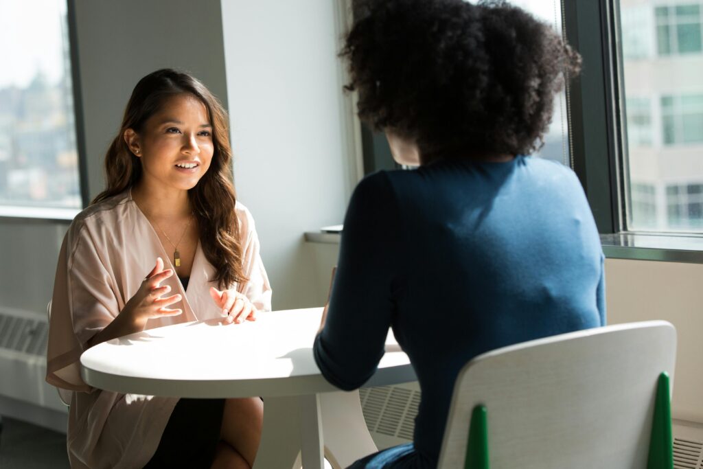Two colleagues discussing together