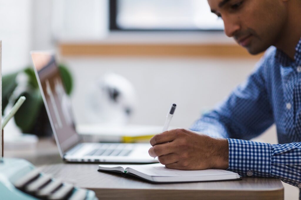 A professional writing a report