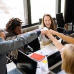 group-of-colleagues A group of colleagues celebrating