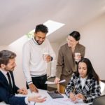 team-meeting A focused meeting and a happy team