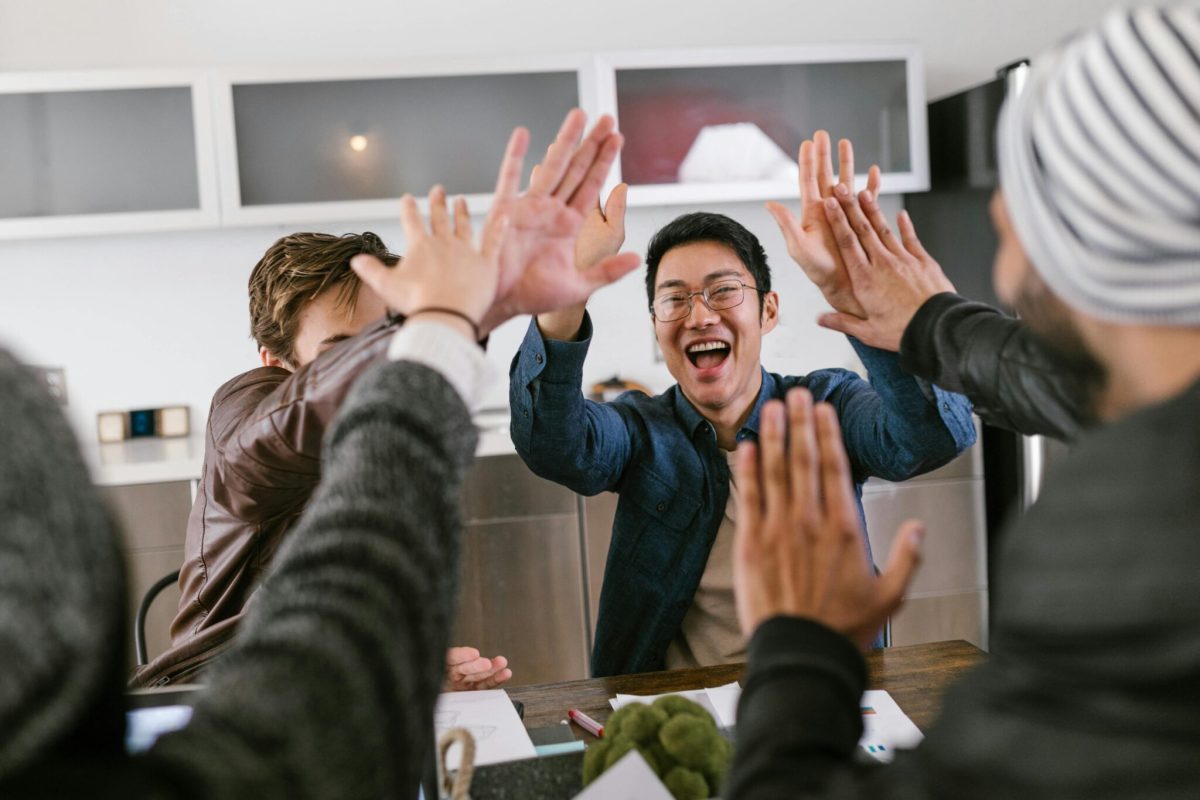 A group of co-workers celebrating achievement