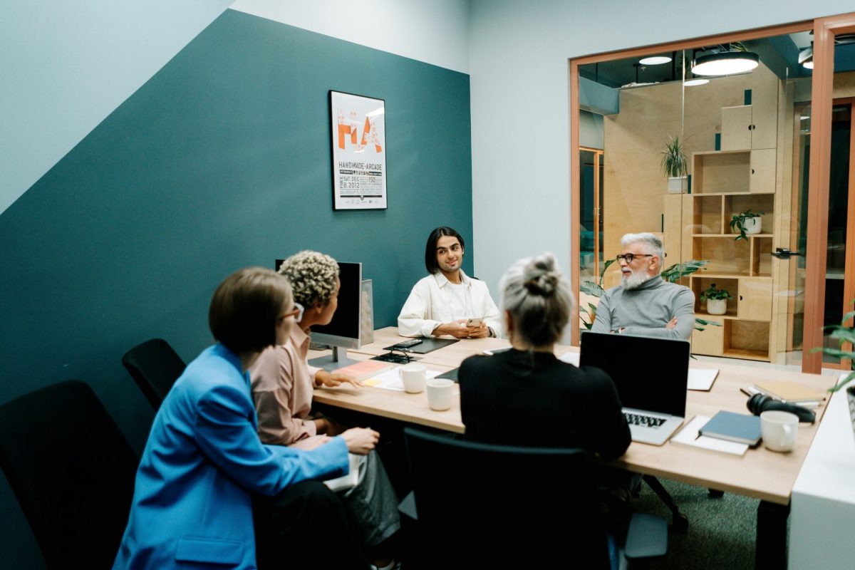A group of colleagues sitting around a table