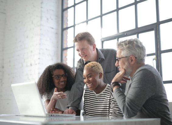 A lively group of coworkers sharing a moment of laughter