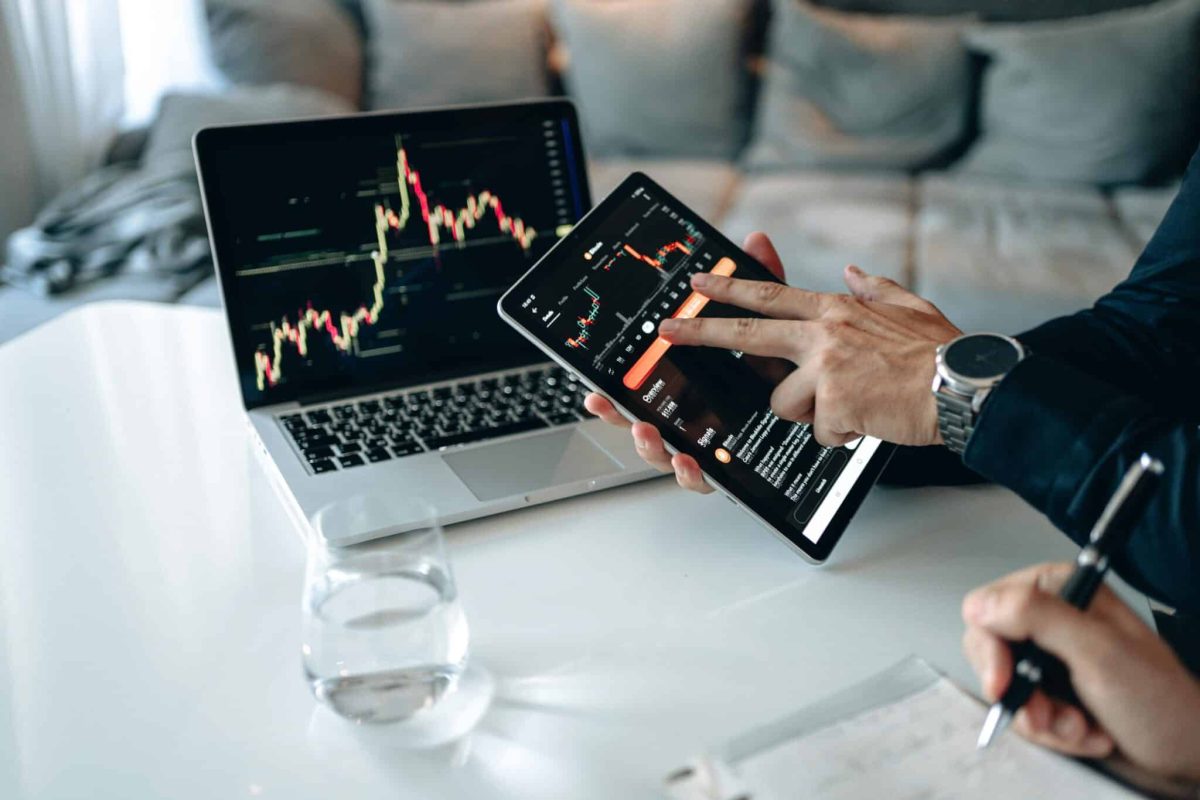 A financial analyst presenting market trends