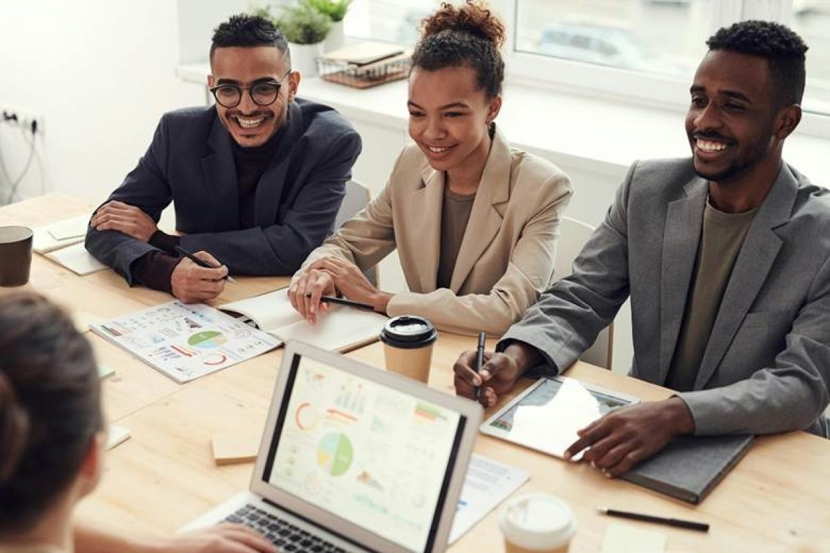 professional-business-team Professional business team reviewing integrated CRM and project management analytics
