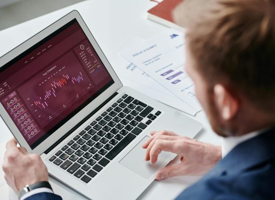 An analyst tracking key performance indicators on an online dashboard