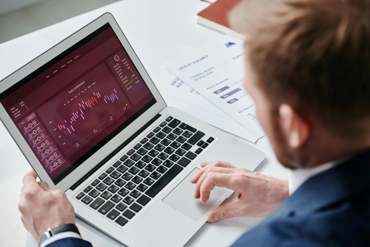 An analyst tracking key performance indicators on an online dashboard